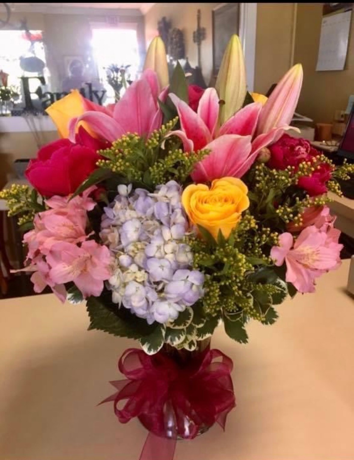 Colorful flower bouquet with lilies and roses